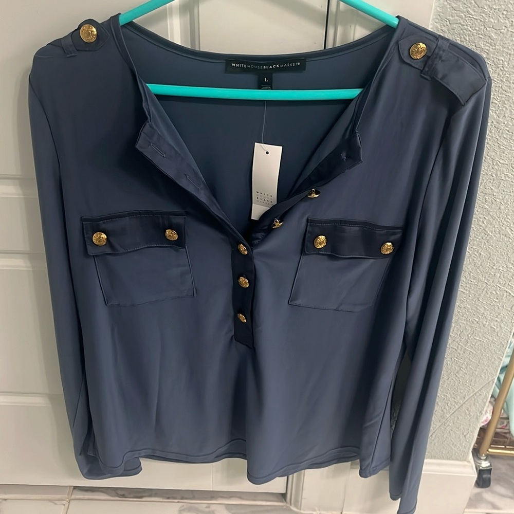 Brand new White House black market women’s blouse. With tags. Size L